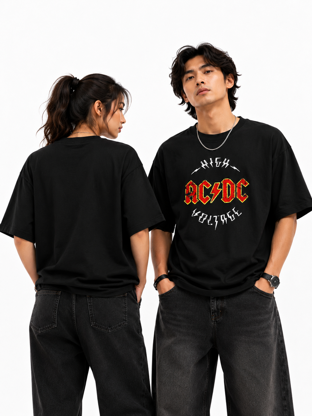 Two people wearing black t-shirts with AC/DC logo on a white background