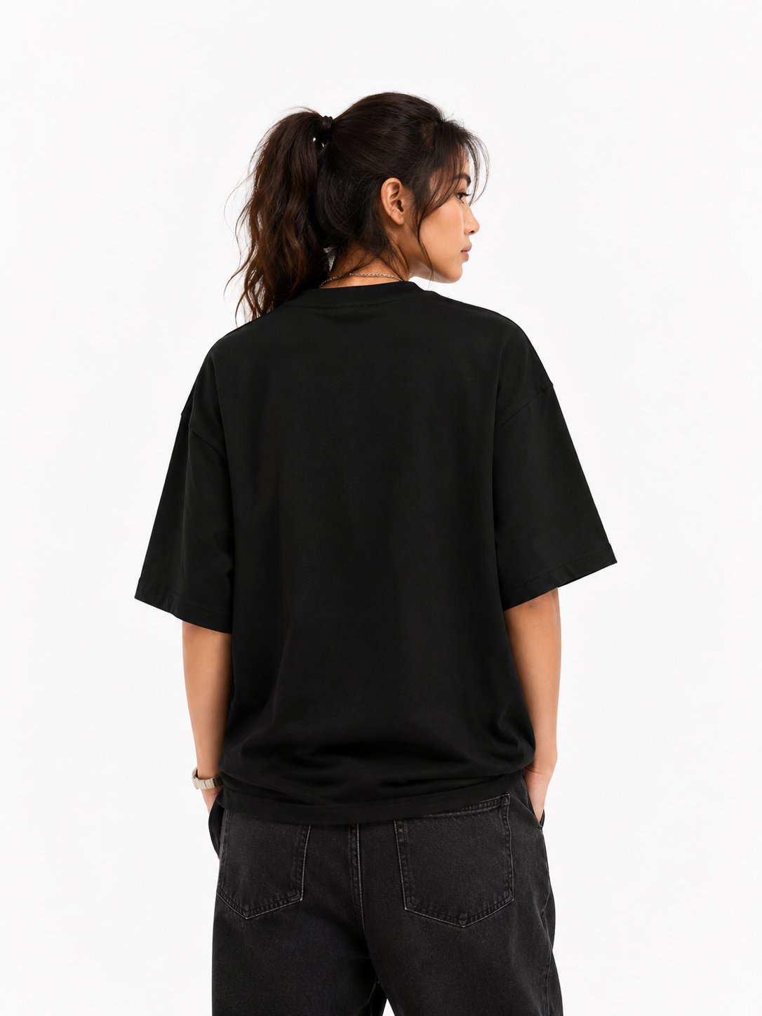 Person wearing a black t-shirt on a white background