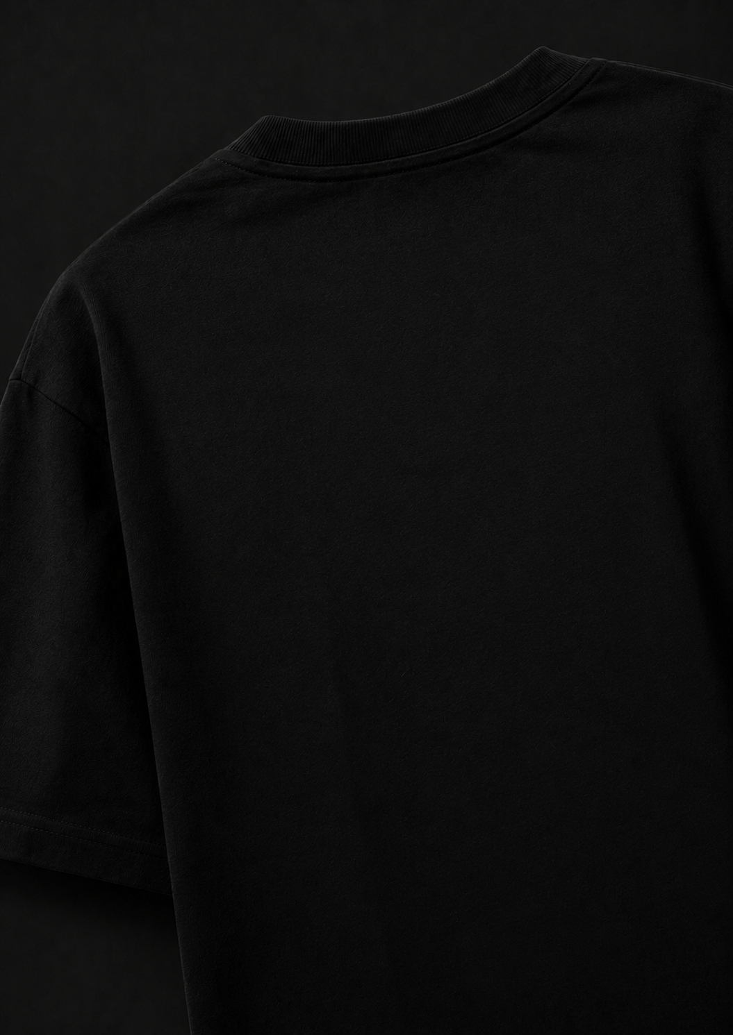 Black t-shirt against a black background